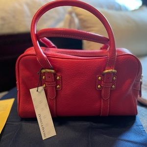 Dooney & Bourke pink medium leather satchel. Never used. Includes dust bag